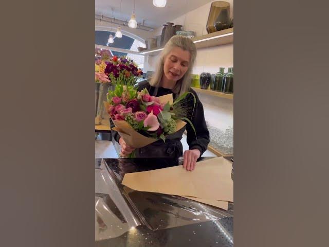 Here’s exactly how we hand wrap our fresh flower bouquets cover