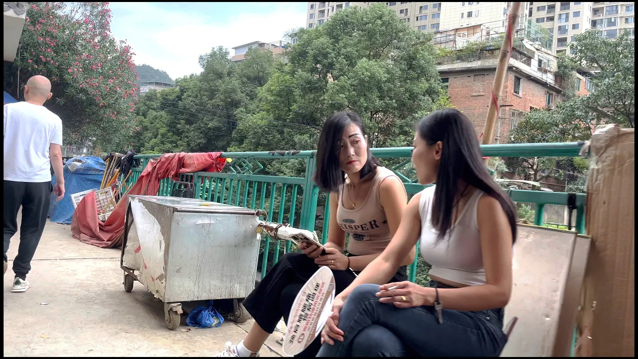 People gambling in the woods at the second-hand goods market in Guiyang, China cover